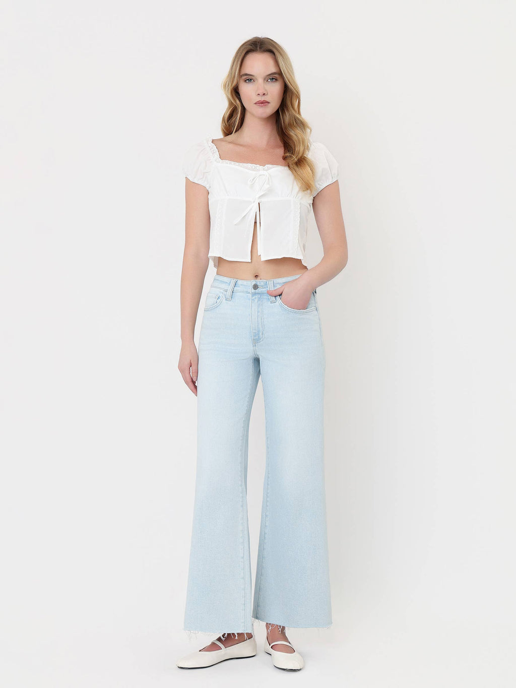 HIGH RISE CLEAN CUT RAW HEM WIDE FLARE JEANS T7401