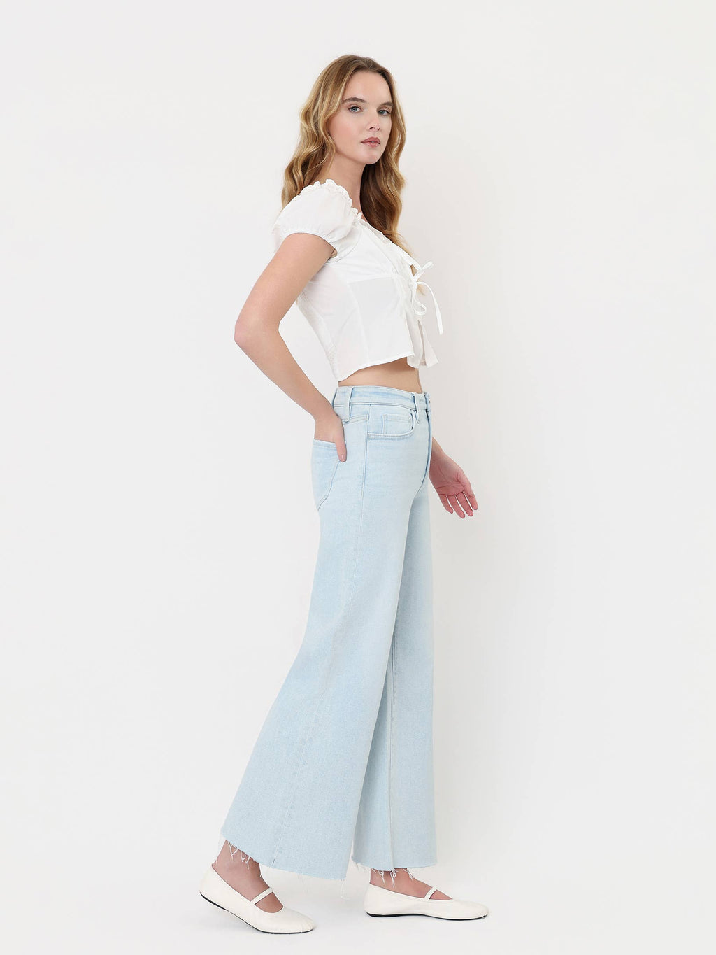 HIGH RISE CLEAN CUT RAW HEM WIDE FLARE JEANS T7401