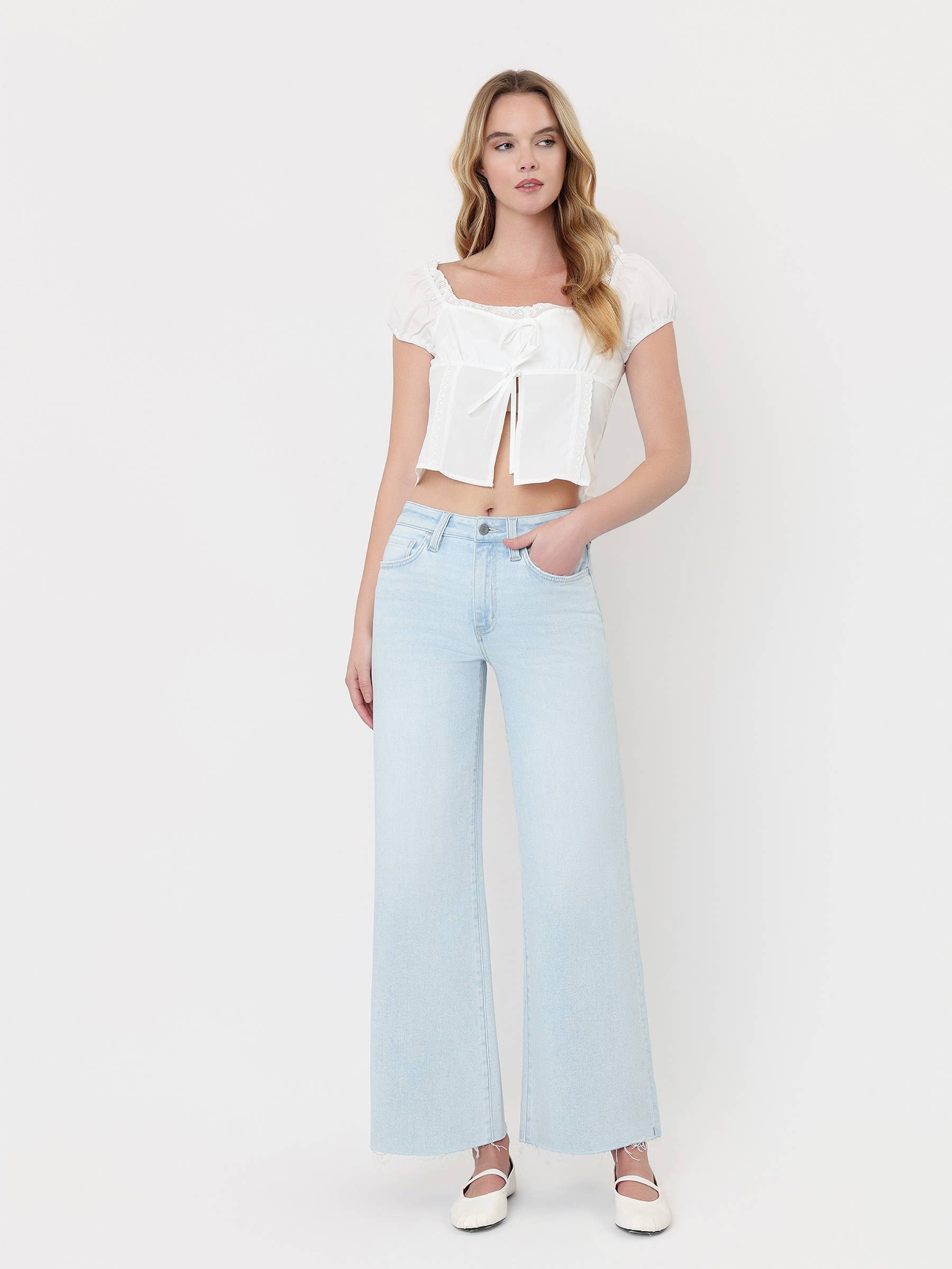 HIGH RISE CLEAN CUT RAW HEM WIDE FLARE JEANS T7401