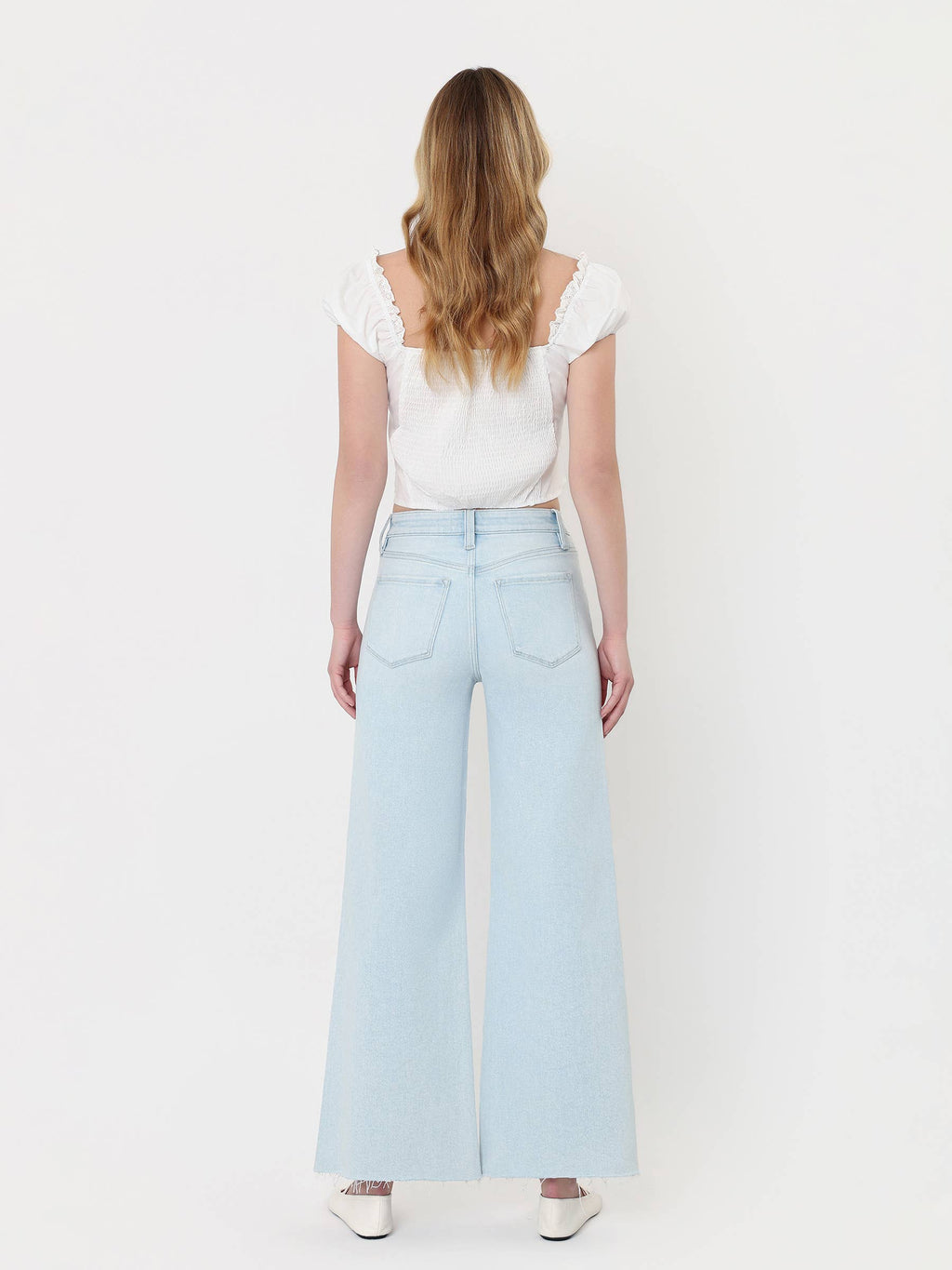 HIGH RISE CLEAN CUT RAW HEM WIDE FLARE JEANS T7401