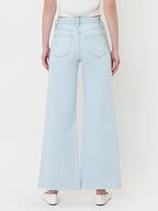 HIGH RISE CLEAN CUT RAW HEM WIDE FLARE JEANS T7401