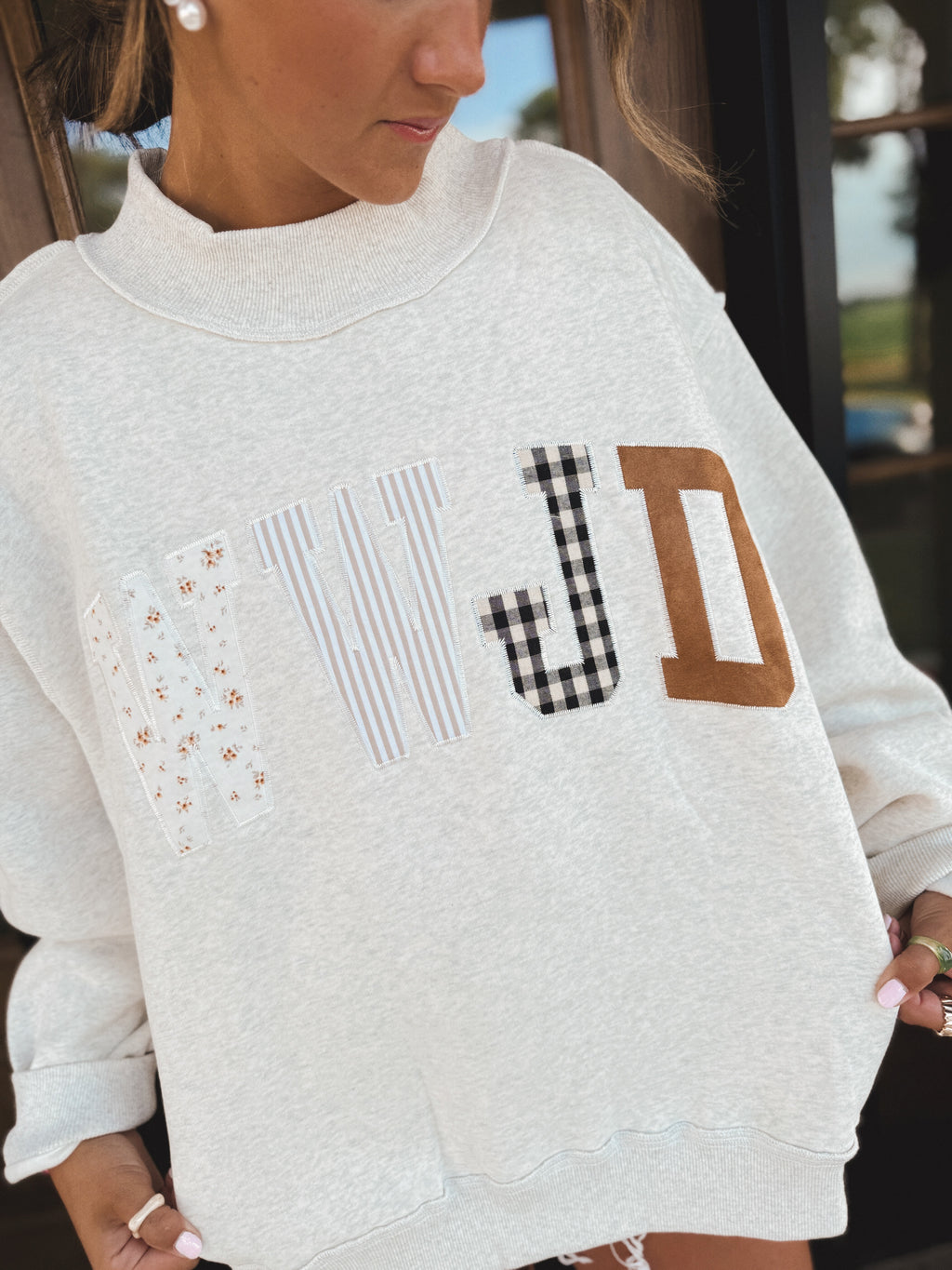 WWJD Embroidered Mock-neck Sweatshirt